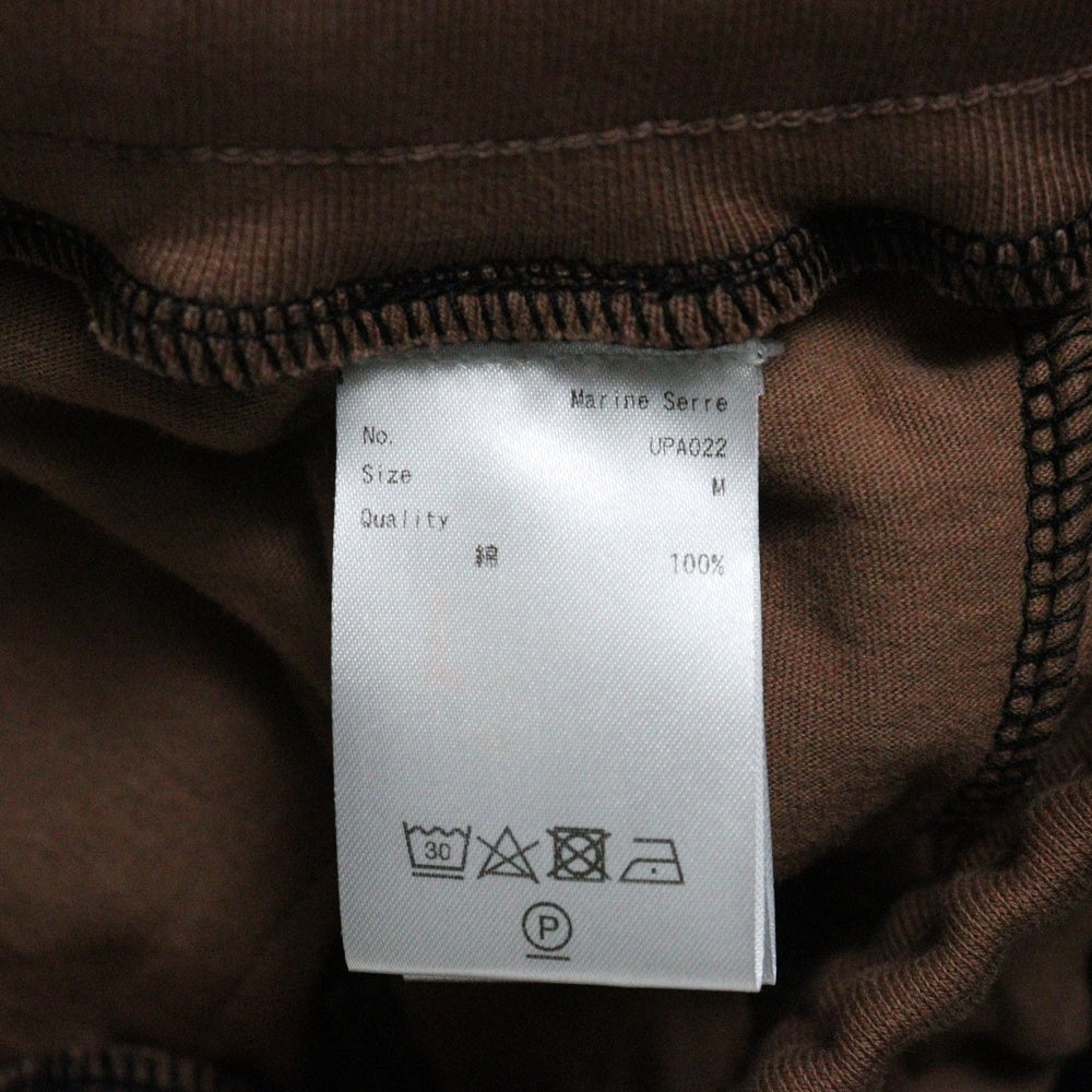 MARINE SERRE(マリーン セル) 23AW REGENERATED GRAPHIC PATCHWORK PANTS ジェネレイテッド グラフィックパッチワーク スウェットパンツ ブラウン/ブラック UPA022