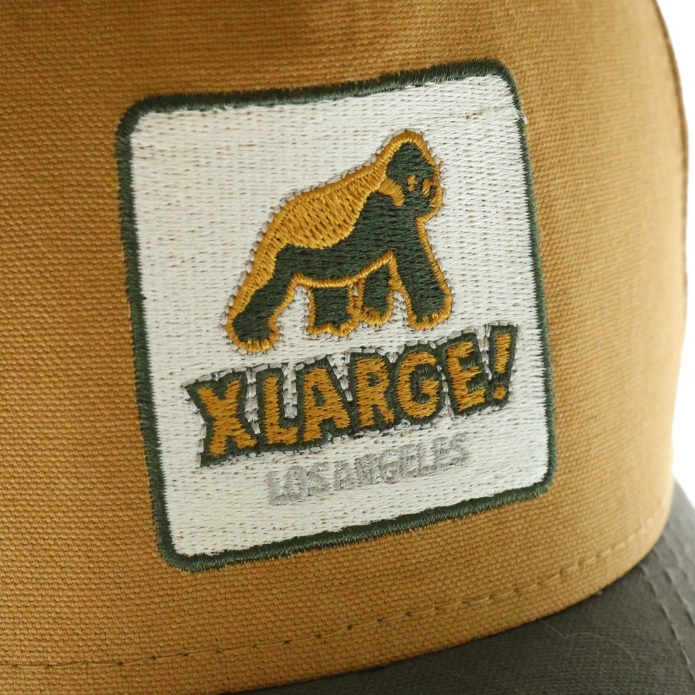 X-LARGE(エクストララージ) ×NEW ERA ニューエラ ロゴパッチ 6パネル キャップ 帽子 ブラウン