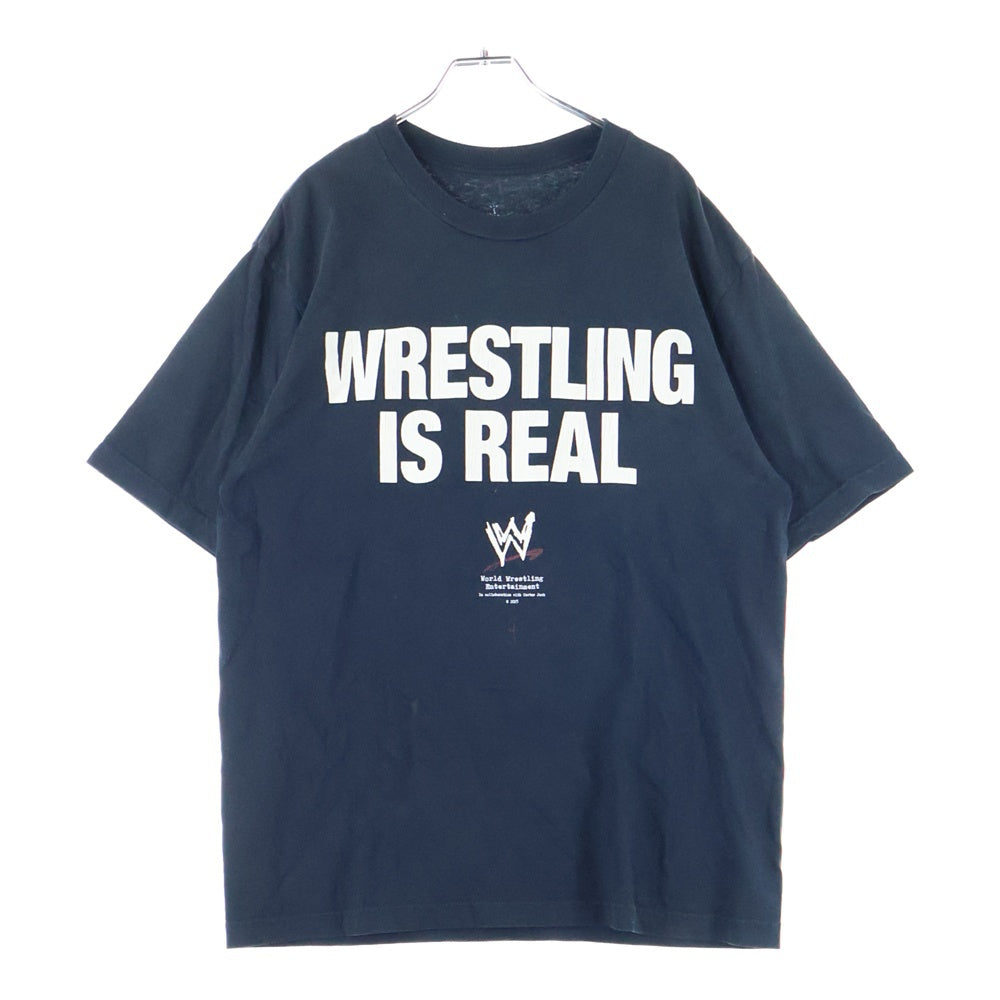 Cactus Jack(カクタスジャック) ×WWE Wrestling Is Real Tee ロゴプリント半袖Tシャツ ブラック