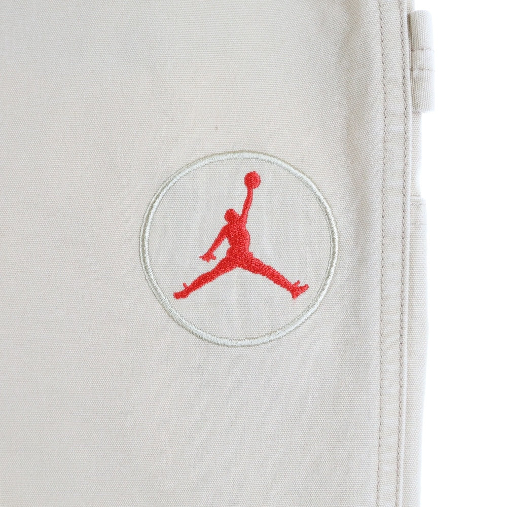 JORDAN BRAND(ジョーダンブランド) ×CACTUS JACK AS M J TS CANVAS PANT カクタスジャック キャンバス ワッペンロゴ イージー ぺインターパンツ ベージュ DD4779-201