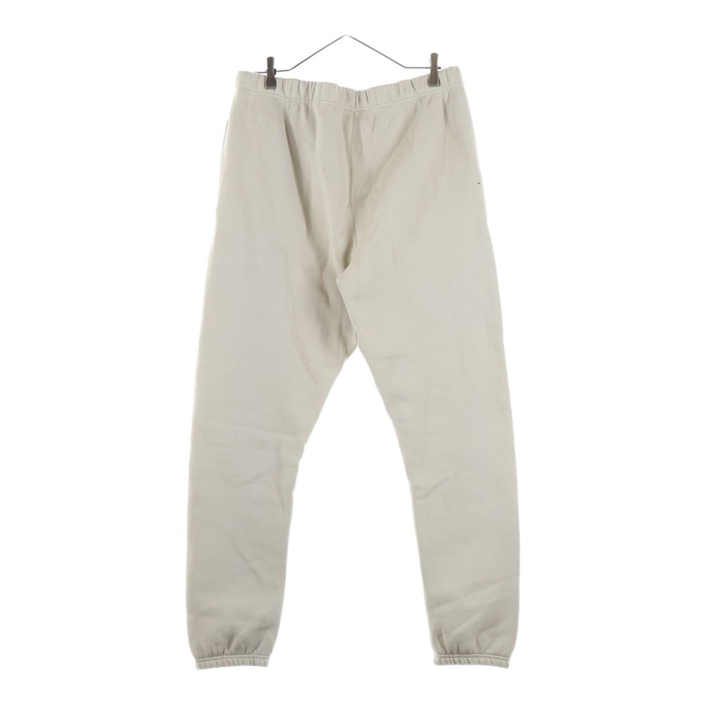 FEAR OF GOD ESSENTIALS(フィアオブゴッド エッセンシャルズ) フロントラバーロゴ スウェット ジョガー ロングパンツ ベージュ