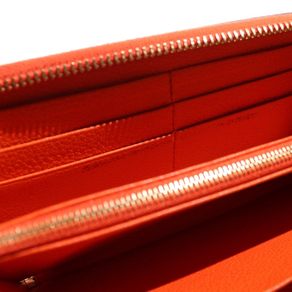 GUCCI(グッチ) ロゴエンボス ラウンドジップ レザー ロングウォレット 長財布 オレンジ 658691 レディース