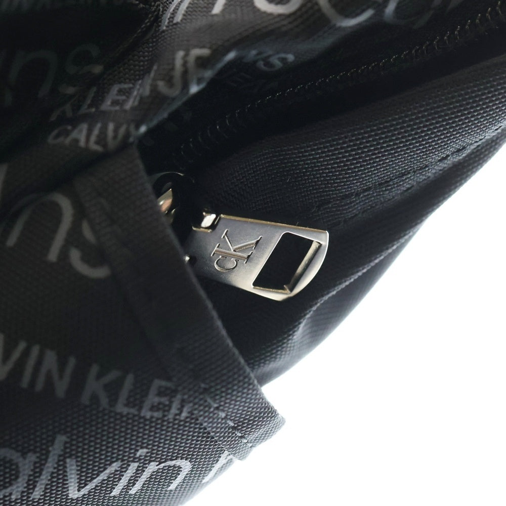 Calvin Klein(カルバンクライン) CKJ SPORT ESSENTIALS ロゴ 総柄 バックパック リュックサック デイパック ブラック HH3018