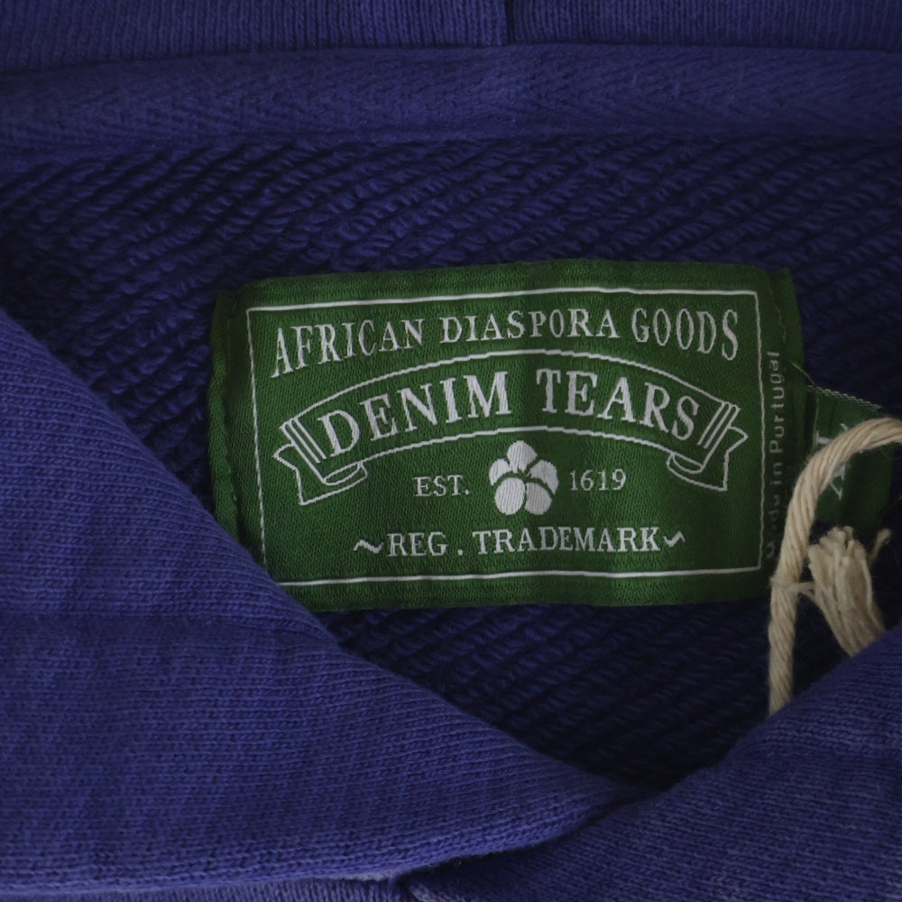 DENIM TEARS(デニムティアーズ) 25SS MONO WREATH HOODIE 総柄 プリント スウェットパーカー パープル SS25THD064