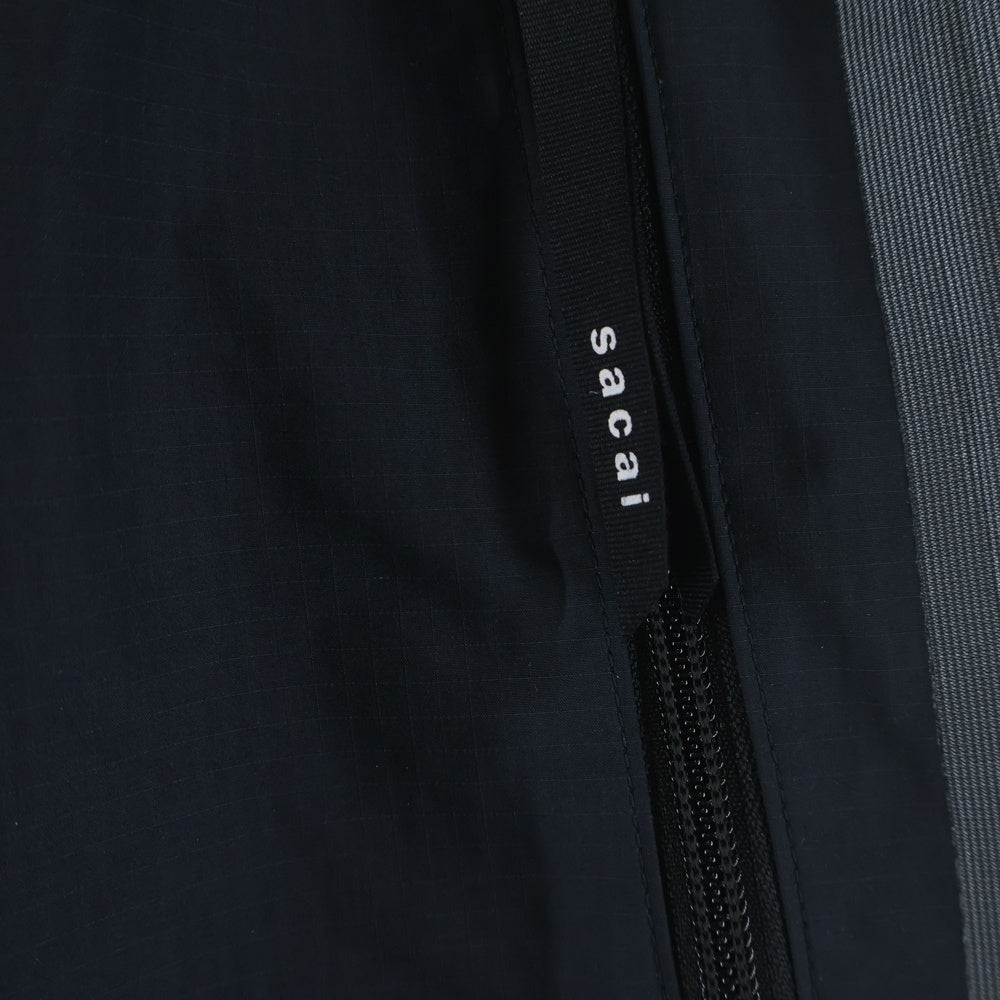 Sacai(サカイ) 21AW ×Kaws Trak Pants カウズ カモフラ トラックパンツ ブラック/カーキ 21-02568M