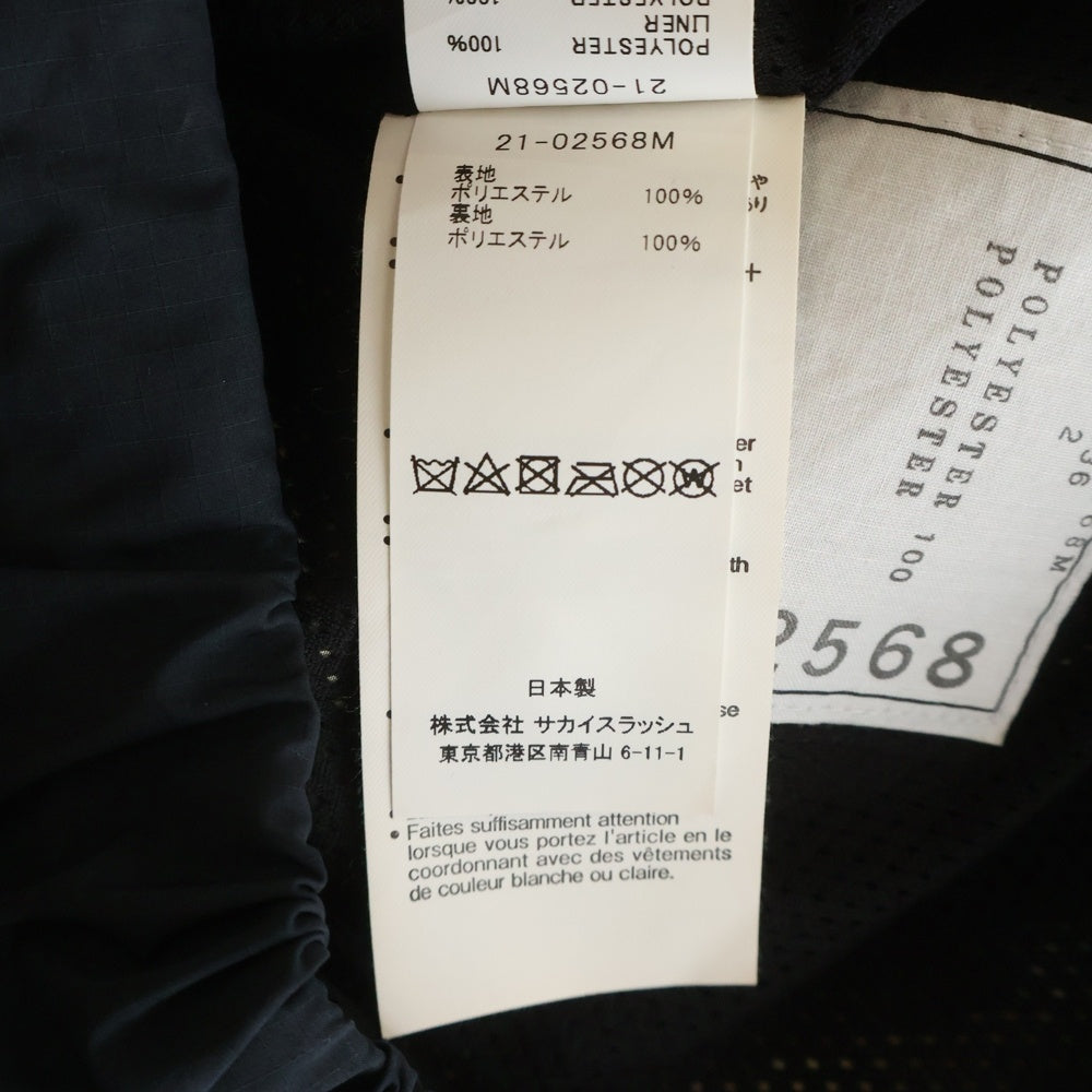 Sacai(サカイ) 21AW ×Kaws Trak Pants カウズ カモフラ トラックパンツ ブラック/カーキ 21-02568M
