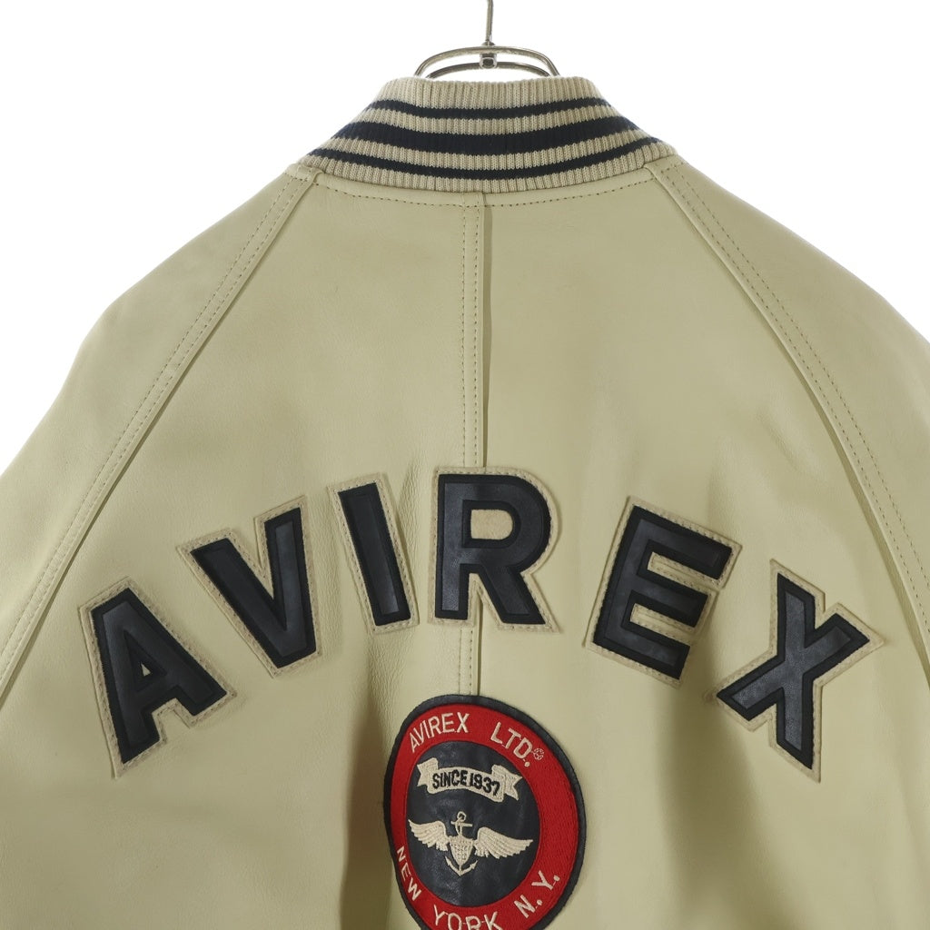 AVIREX(アヴィレックス) アーチロゴ ワッペン ジップアップ レザーバーシティジャケット スタジャン ベージュ