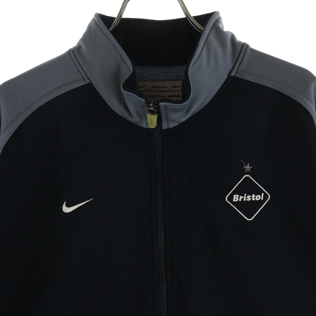F.C.R.B./F.C.Real Bristol/FCRB(エフシーアールビー/エフシーレアルブリストル) ×ナイキ ロゴデザイン ドローコード付き ジップアップ ジャージ トラックジャケット ブラック/グレー