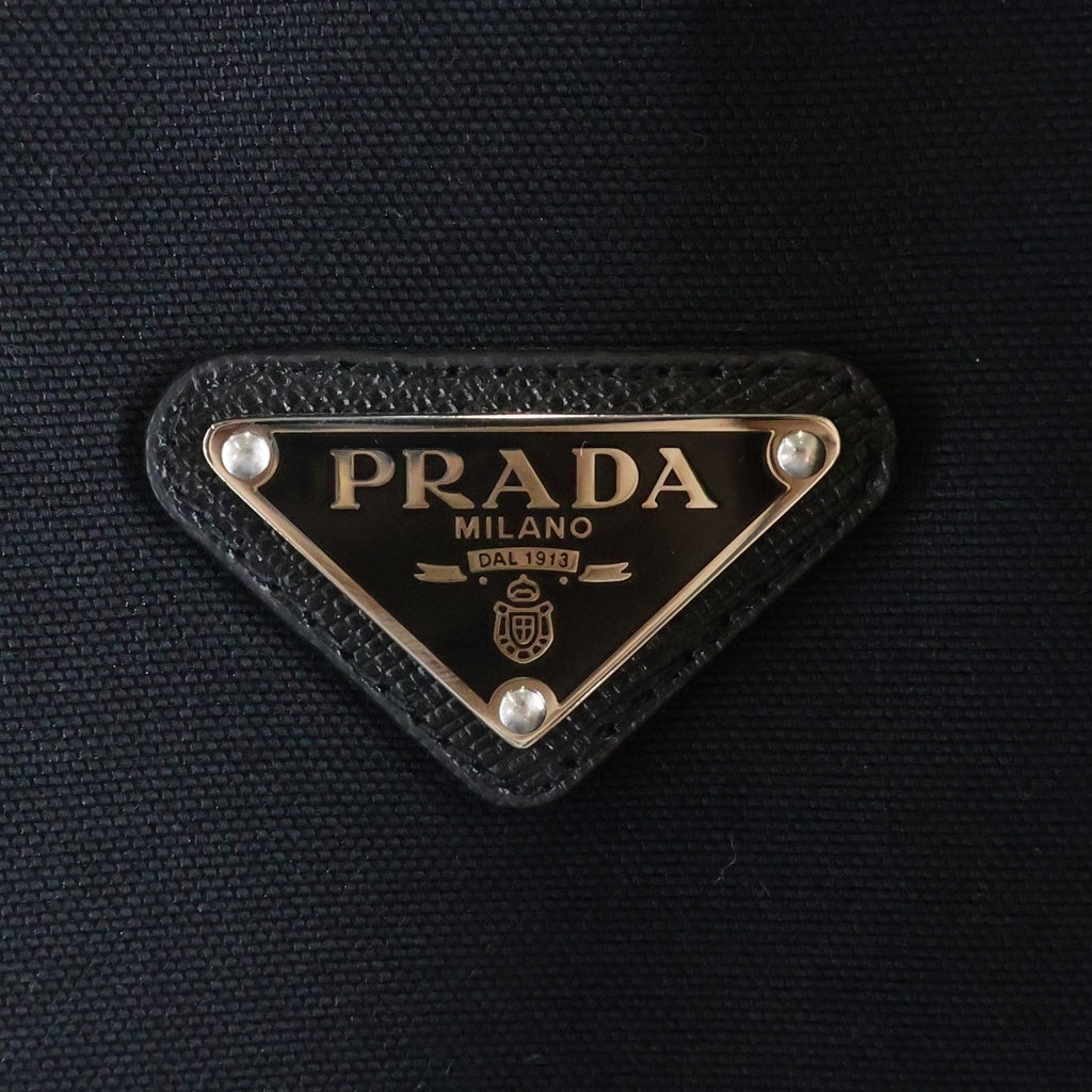 PRADA(プラダ) トライアングル ロゴプレート キャンバスブルゾン ジップアップジャケット ブラック SGC278