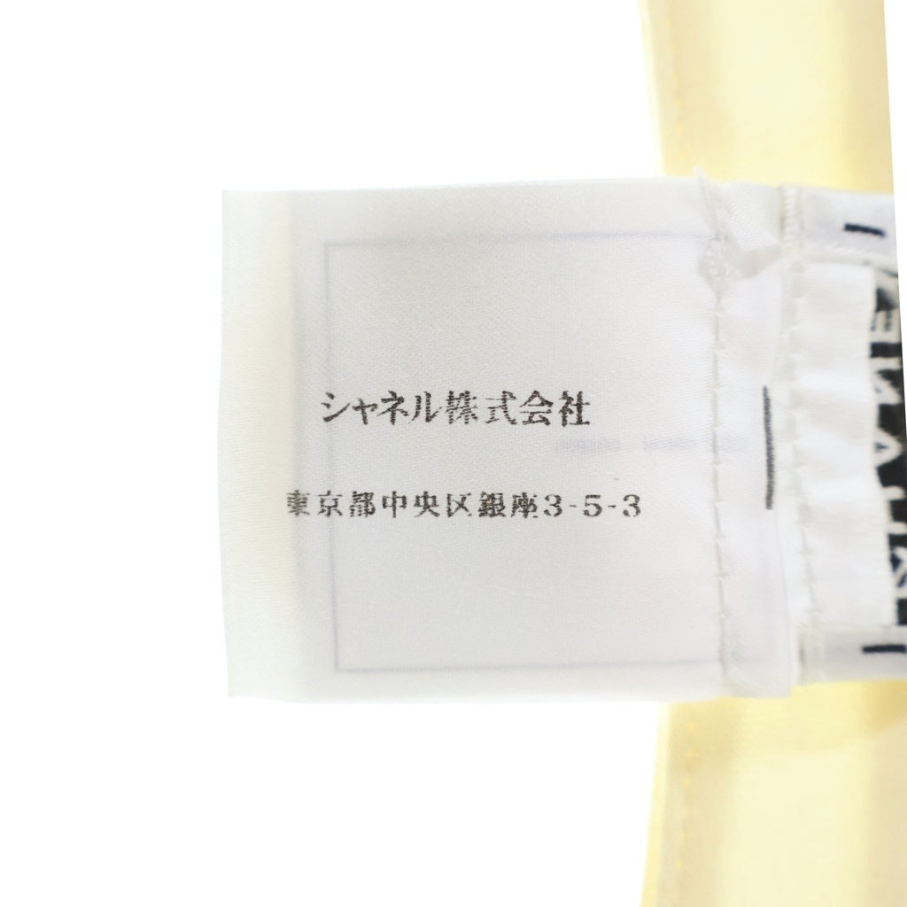CHANEL(シャネル) フラワー グラフィック ショルダーボタン ノースリーブ カットソー トップス ホワイト レディース P51464V38380