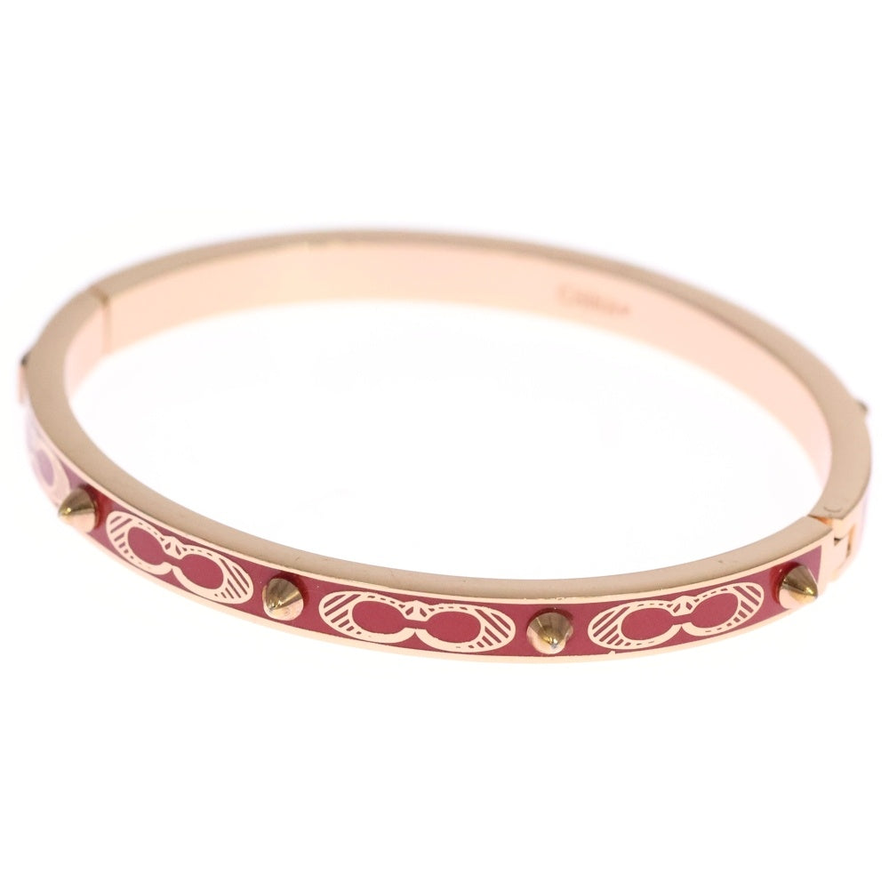 COACH(コーチ) シグネチャー スタッズ バングル ブレスレット ピンクゴールド/レッド