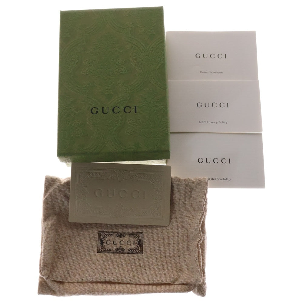 GUCCI(グッチ) GGエンボス レザー コンパクトウォレット 二つ折り財布 ホワイト×ブラック 676150