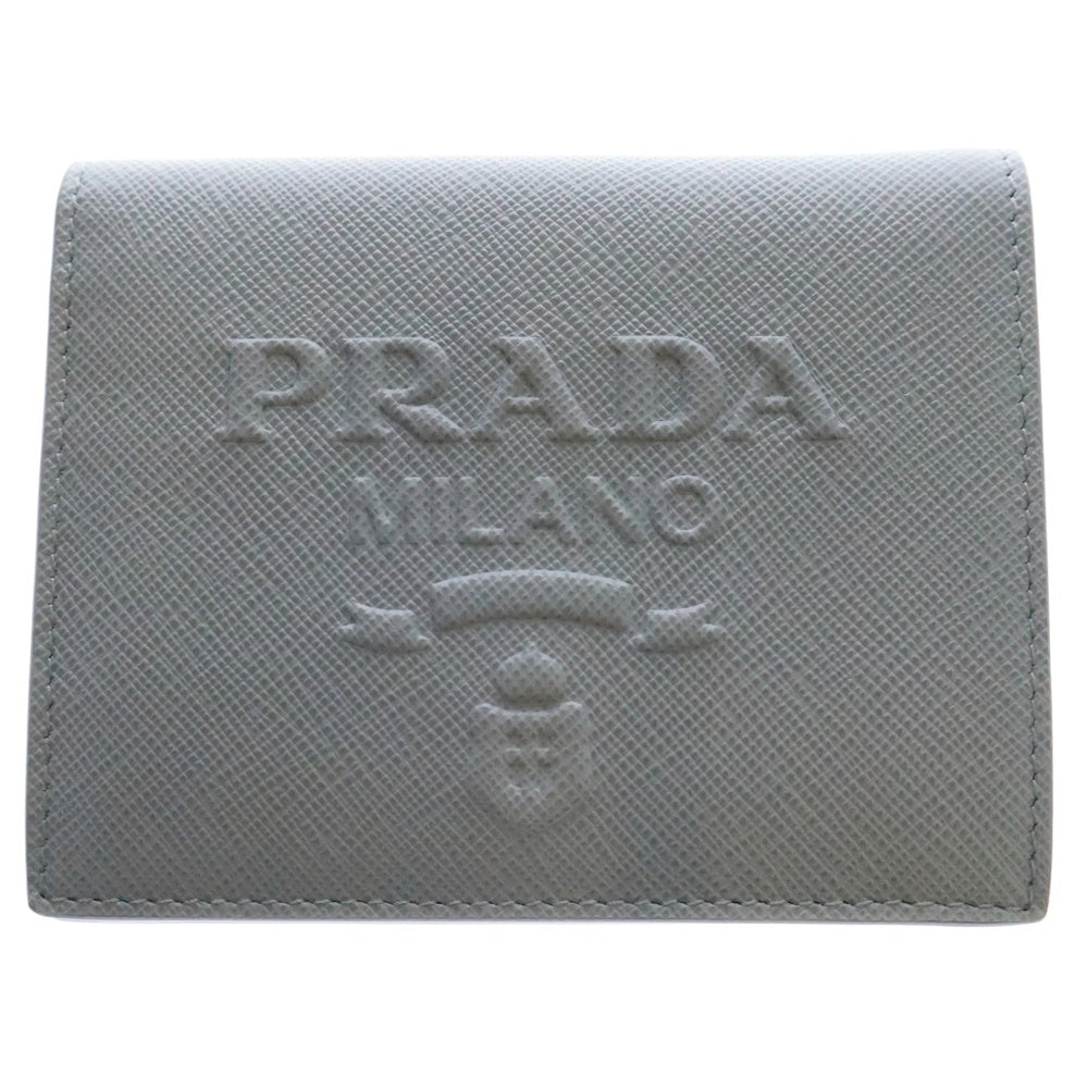 PRADA(プラダ) サフィアーノ エンボス 二つ折り財布 コンパクトウォレット ライトブルー レザー 1MV204