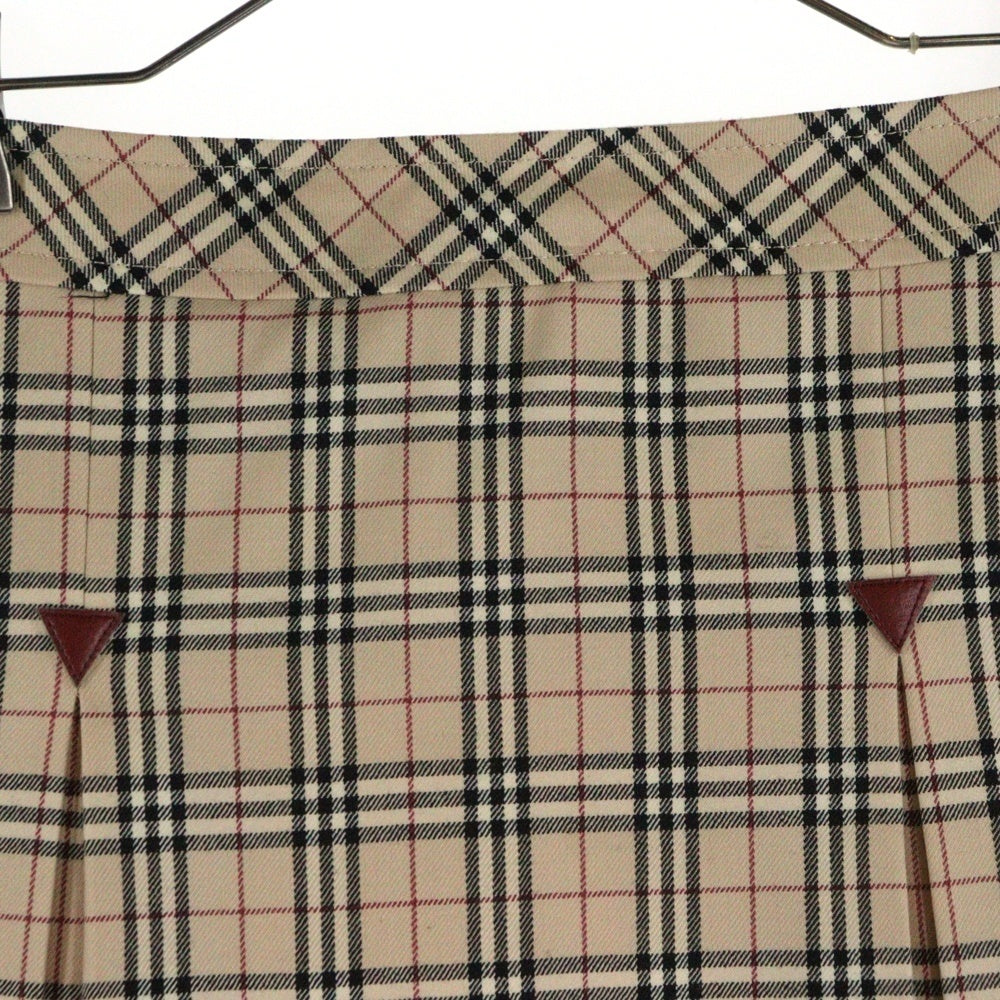 BURBERRY BLUE LABEL(バーバリーブルーレーベル) ノバチェック総柄 ウール レザーパッチ フレア ミディアム スカート ベージュ レディース