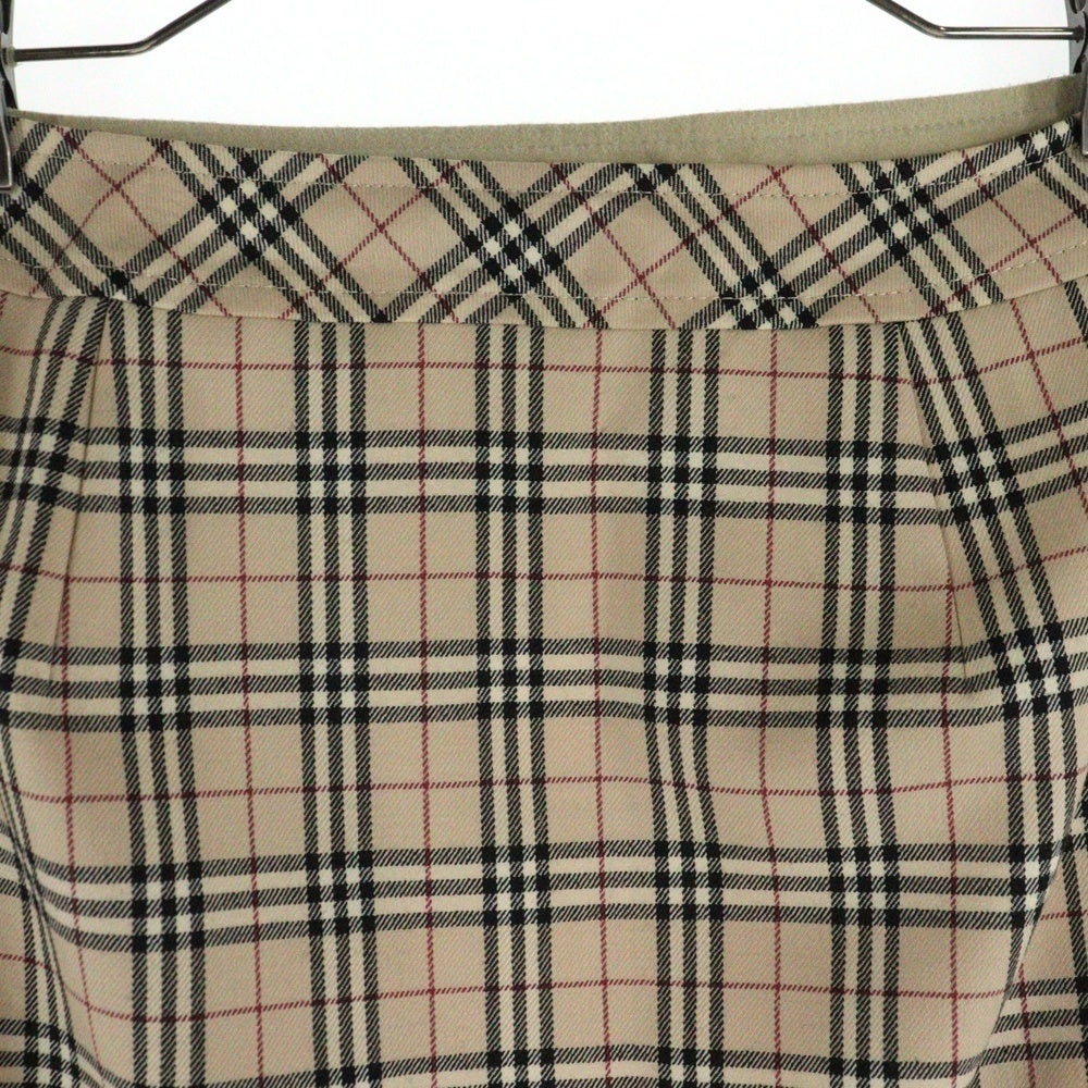 BURBERRY BLUE LABEL(バーバリーブルーレーベル) ノバチェック総柄 ウール レザーパッチ フレア ミディアム スカート ベージュ レディース