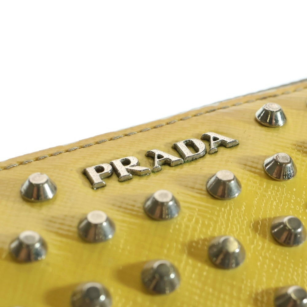 PRADA(プラダ) パテントレザー スタッズ ラウンドファスナー ロングウォレット 長財布 シルバー金具 イエロー 1M0206