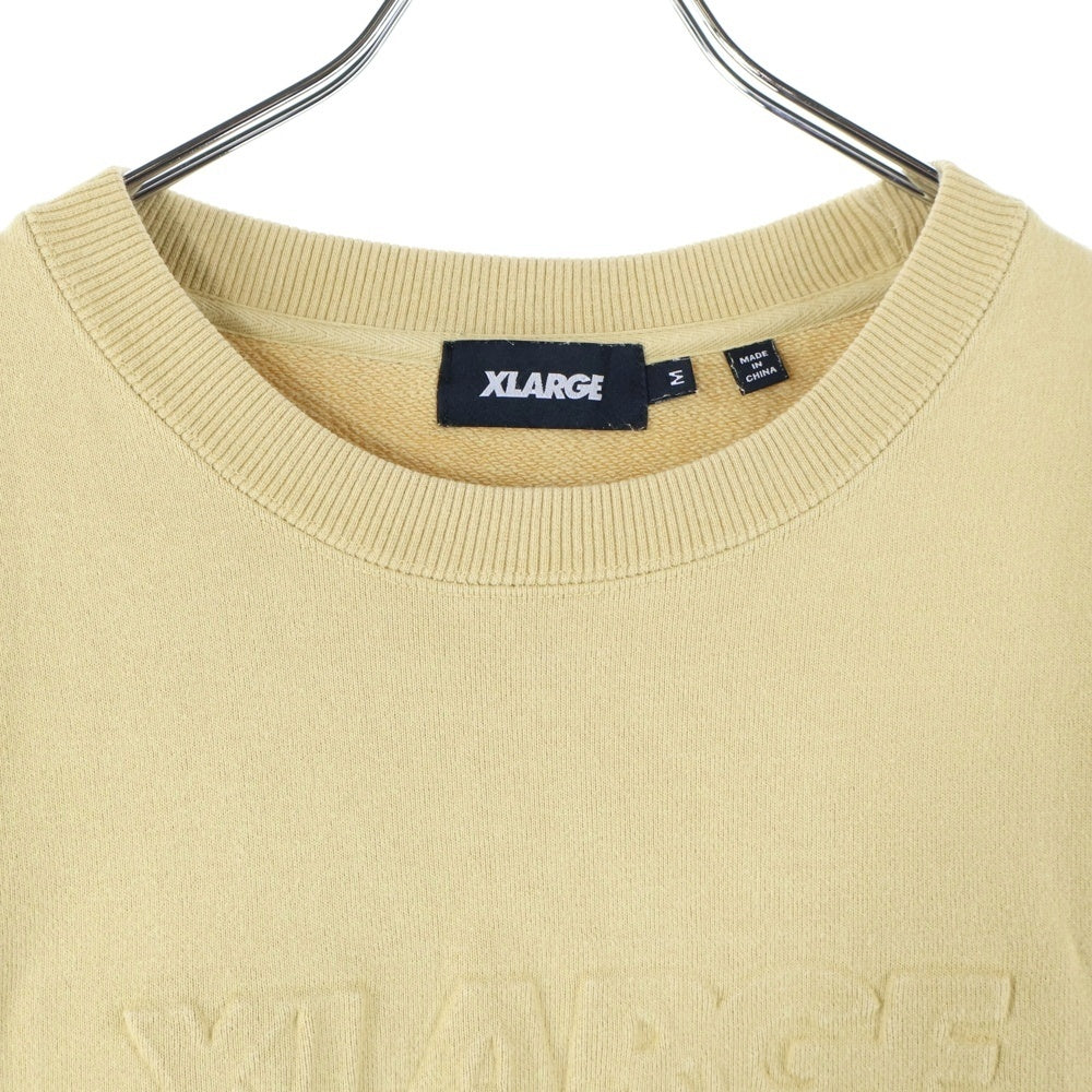 X-LARGE(エクストララージ) エンボス加工 フロントロゴスウェット 長袖トレーナー ベージュ