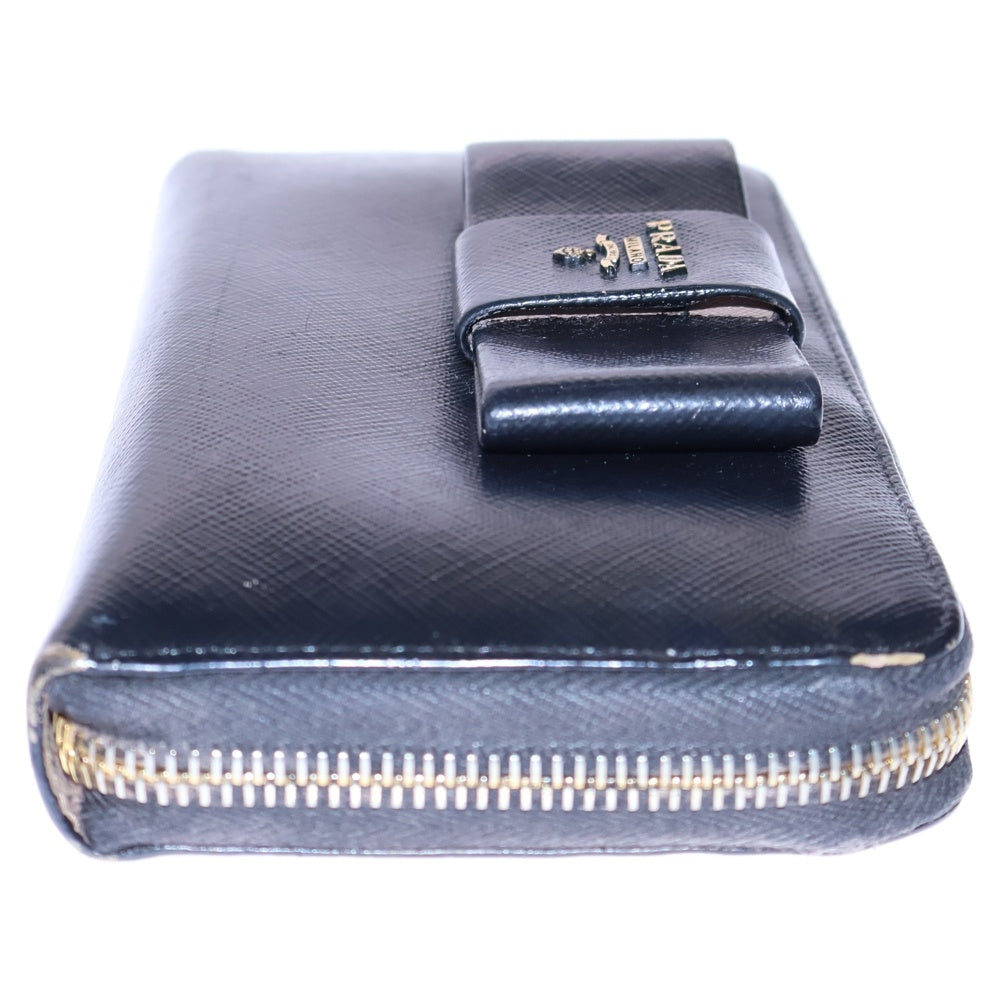 PRADA(プラダ) サフィアーノレザー ロゴプレート リボン ラウンドファスナー ロングウォレット 長財布 ゴールド金具 ブラック 1M0506