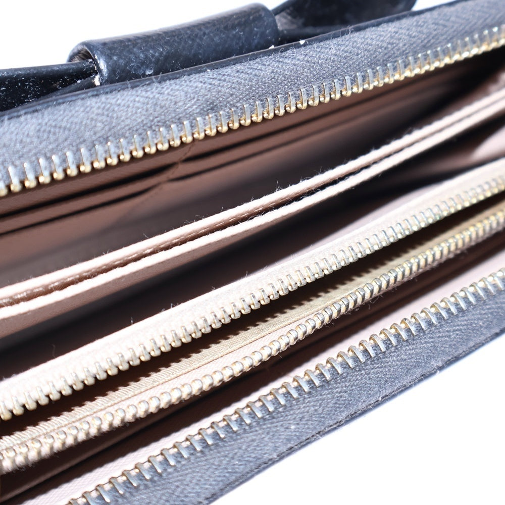 PRADA(プラダ) サフィアーノレザー ロゴプレート リボン ラウンドファスナー ロングウォレット 長財布 ゴールド金具 ブラック 1M0506