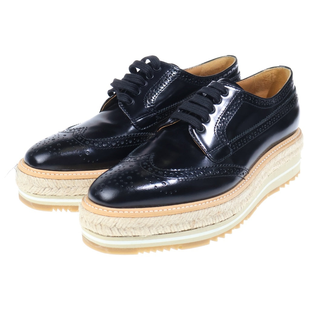 PRADA(プラダ) エスパドリーユ ウイングチップ メダリオン 厚底 レザー ローカット シューズ ブラック レディース