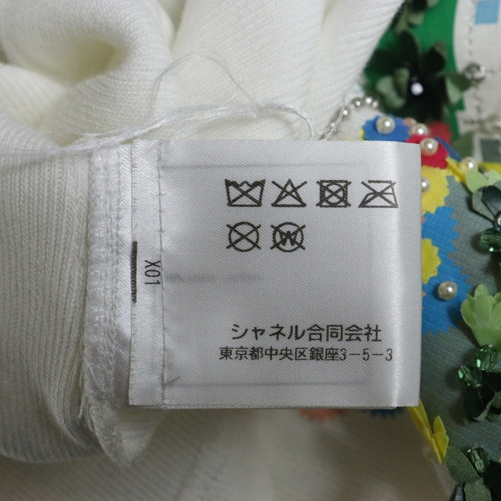 CHANEL(シャネル) ココマーク ロゴプレート フロッキープリント ラインストーン レーシングプリント 半袖 コットンニット トップス ホワイト レディース P74086V64275