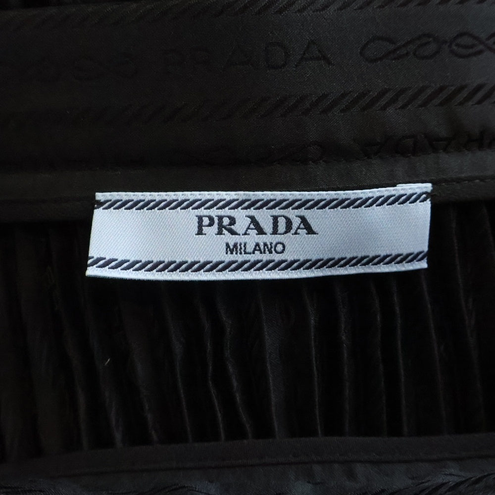 PRADA(プラダ) 22AW ロゴ総柄 ペチコート付プリントプリーツロングスカート ブラック P136U レディース