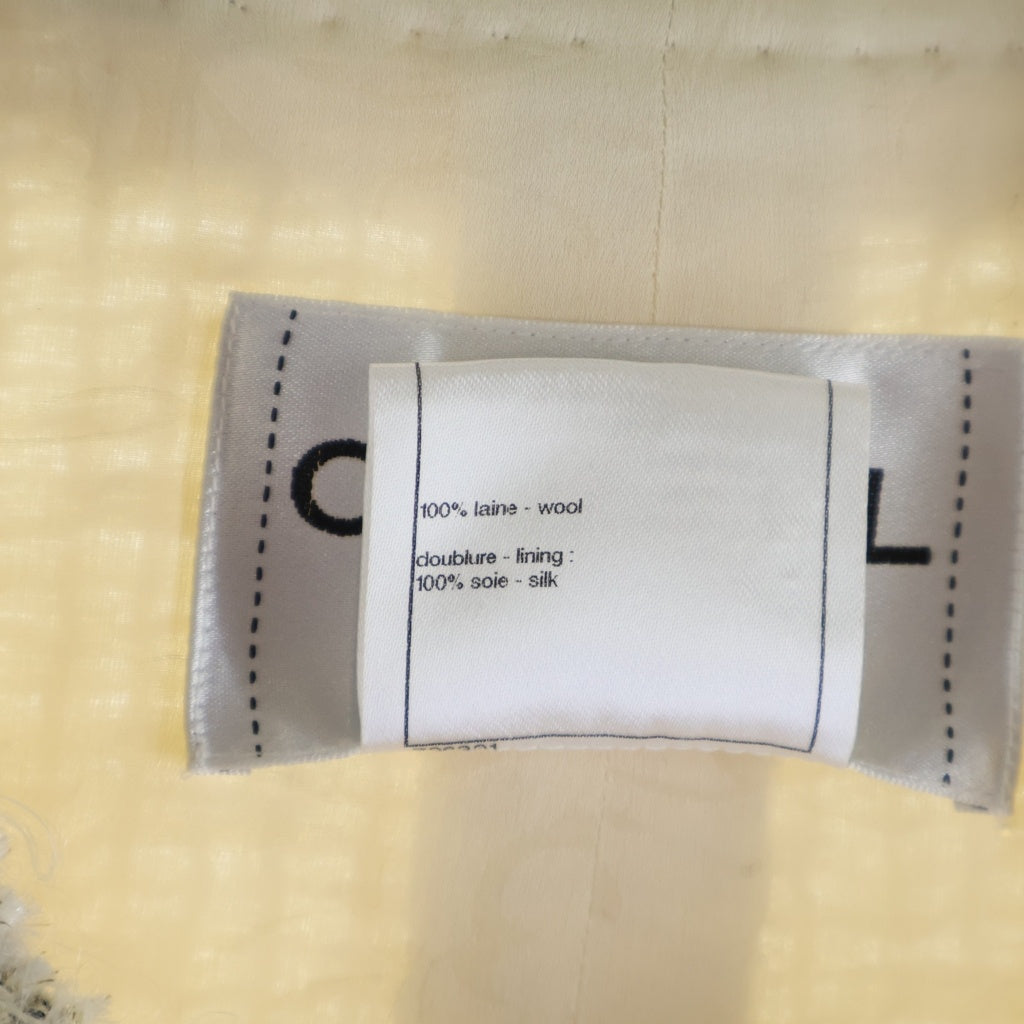 CHANEL(シャネル) ココマークボタン チェーン装飾 ウール ツイード ノーカラー ロングジャケット ホワイト #40 P41877V28385 レディース