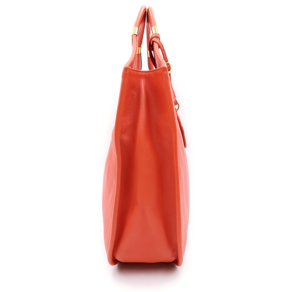 Christian Dior(クリスチャンディオール) ロゴチャーム トートバッグ ハンドバッグ オレンジ レザー ゴールド金具 レディース
